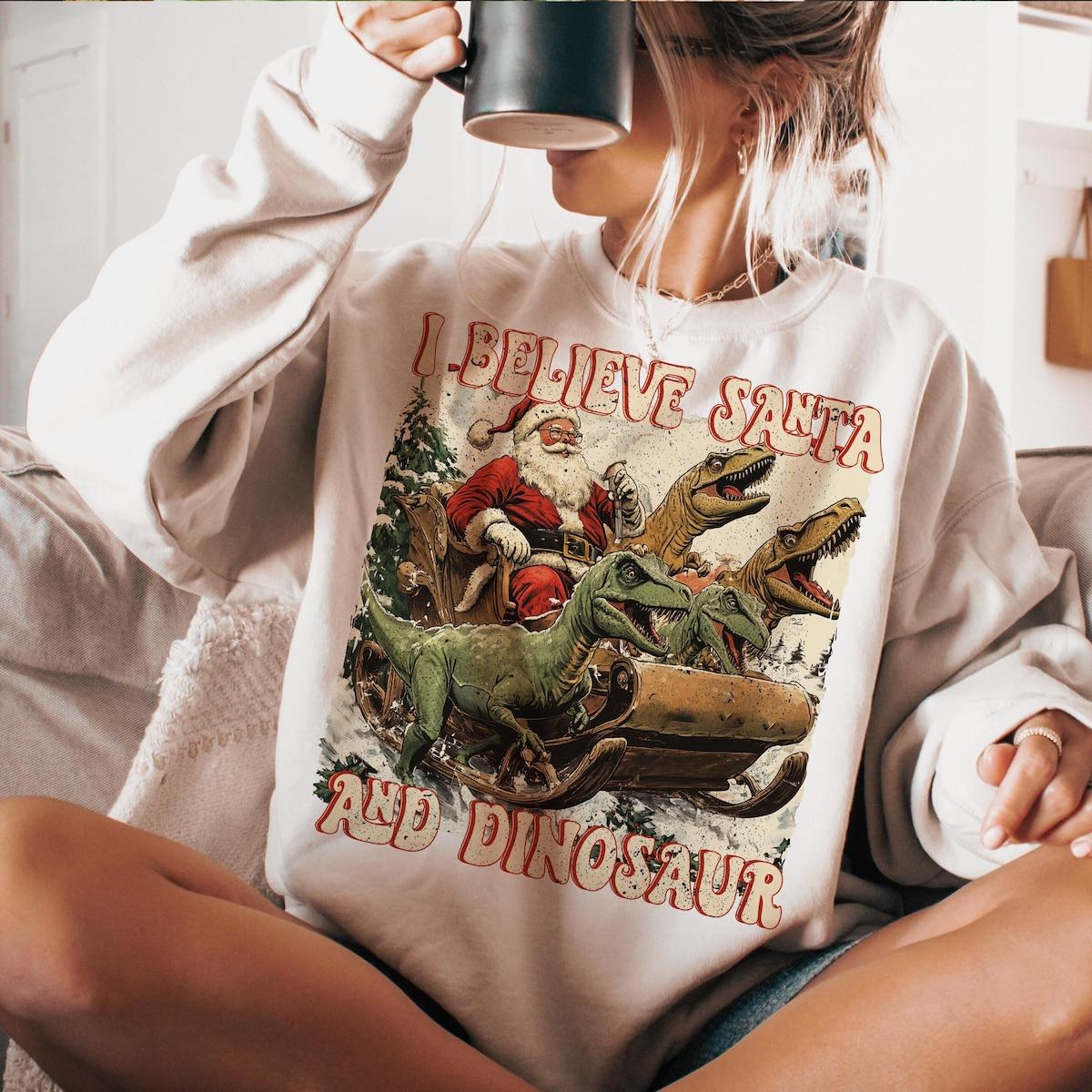 I Believe In Santa And Dinosaurs Christmas Santa Sweatshirts 1